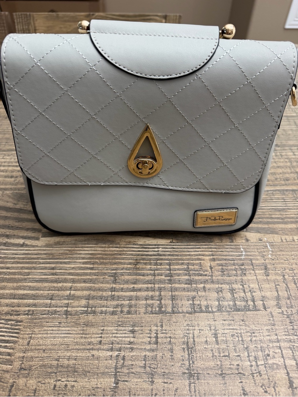 Bella Russo Quilted Light Gray Shoulder Bag with Gold-Tone Accent